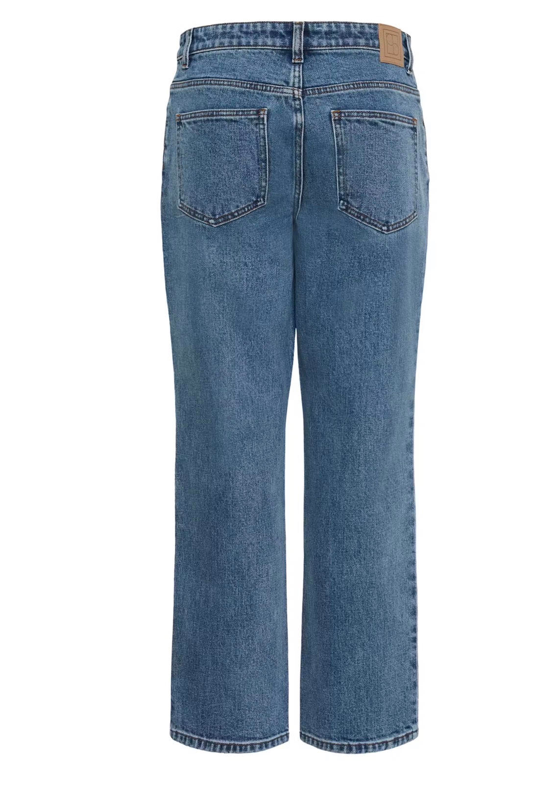 Back view of a pair of medium-wash blue denim jeans with a straight-leg or wide-leg fit, featuring classic five-pocket styling and a tan leather patch on the back waistband.